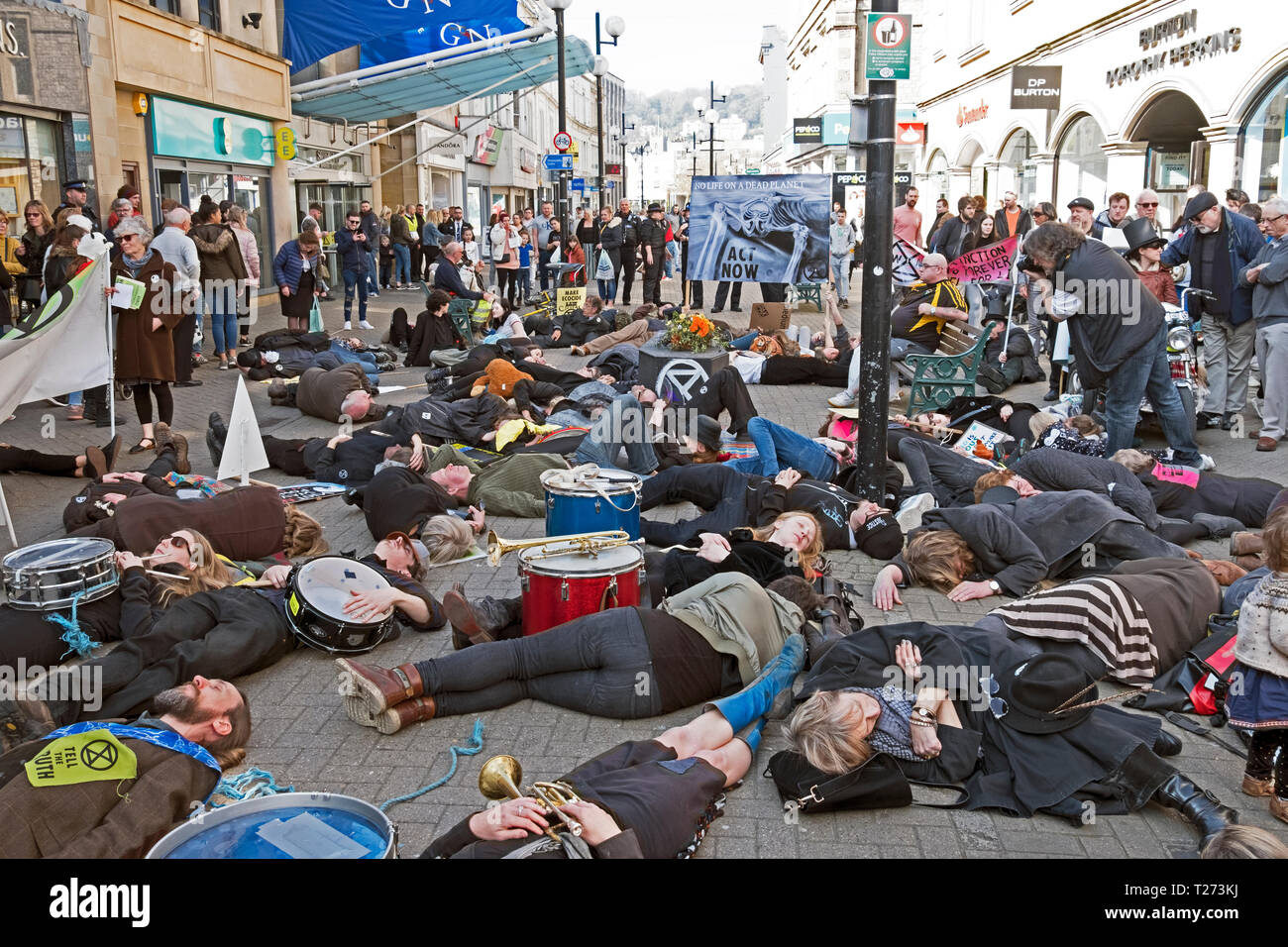 Weston-super-Mare, UK. 30th March, 2019. Protestors against climate change stage a die-in on the High Street. The demonstration was organised by Extinction Rebellion Weston-super-Mare. Keith Ramsey/Alamy Live News Stock Photo