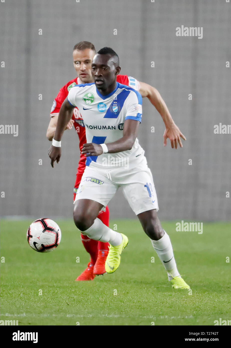 BUDAPEST, HUNGARY - MARCH 2: (r-l) David Markvart of DVTK controls the ball  next to Roland Varga of Ferencvarosi TC during the Hungarian OTP Bank Liga  match between Ferencvarosi TC and DVTK