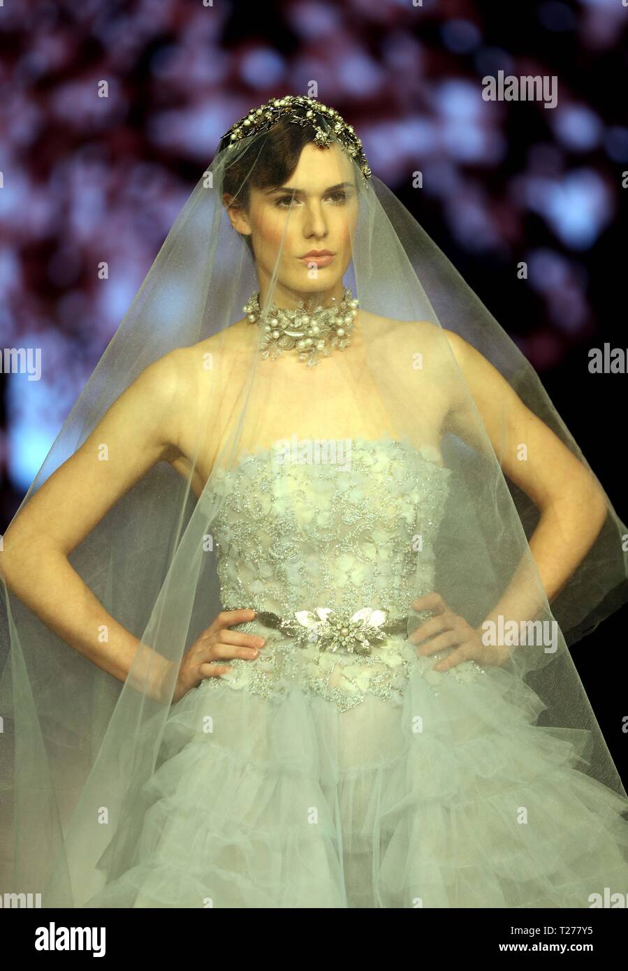 Amman, Jordan. 30th Mar, 2019. A model presents a creation on a show of Jordan Fashion Week in Amman, Jordan, on March 30, 2019. The event, which will last for two days, is the annual official fashion week of Jordan that started in 2018, supporting and promoting local designers and creators in the Jordan fashion industry. Credit: Mohammad Abu Ghosh/Xinhua/Alamy Live News Stock Photo