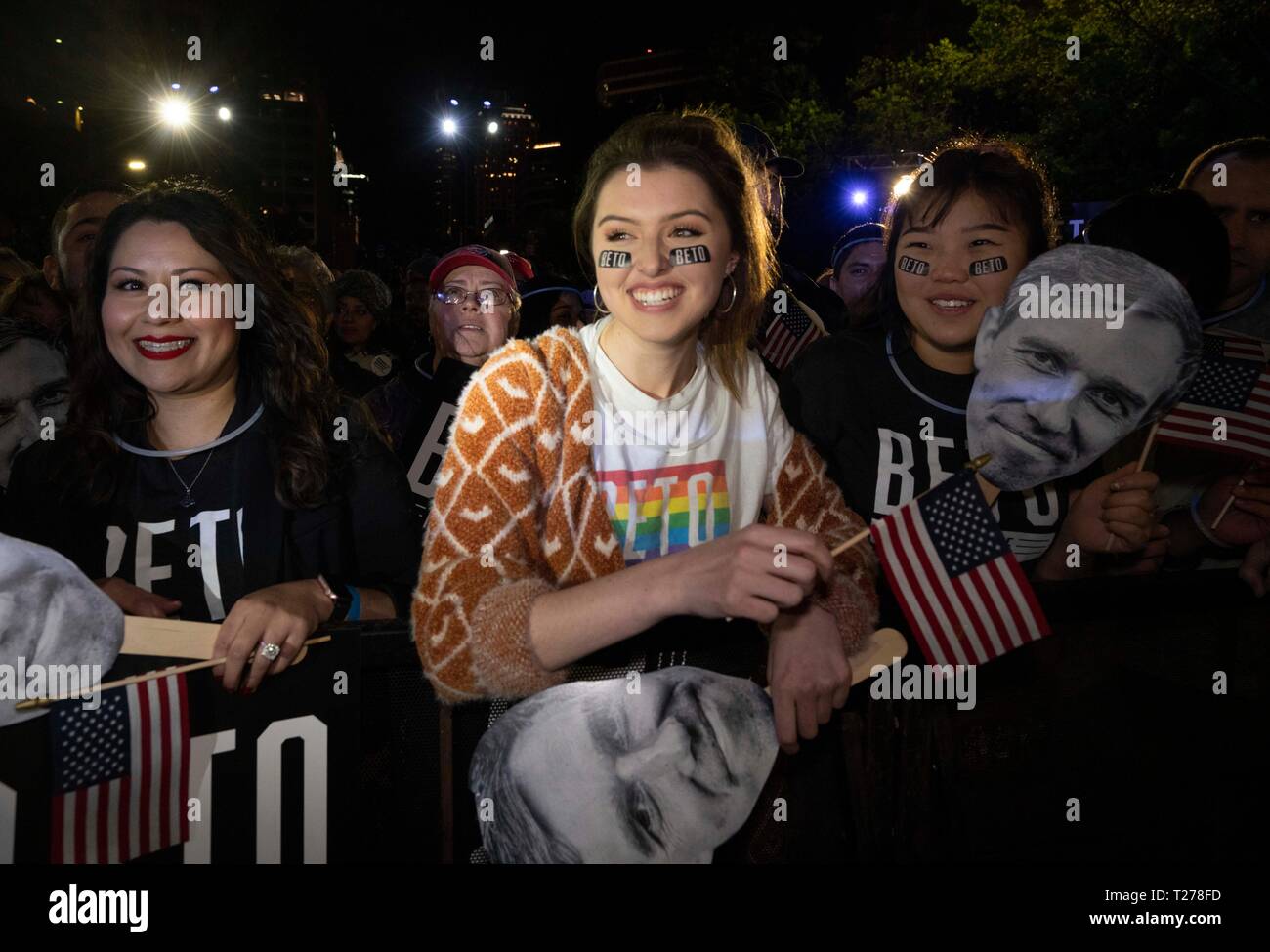 Young supporter wearing Beto eye black sticker smiles as the former congressman Beto O'Rourke of El Paso, TX kicks off his presidential campaign at a late night rally in front of the Texas Capitol. Stock Photo