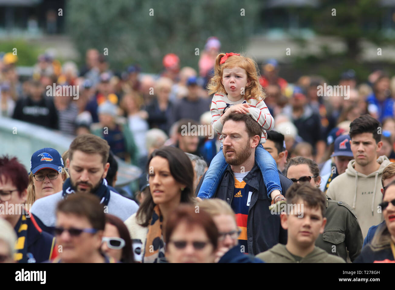 Adelaide Australia 31st March 2019.  Fans arrive at the Adelaide Oval for the 2019 AFL Women's Grand Final between Adelaide Crows and Carlton Football Club. The AFLW is an Australian rules football league for female players with the first season of the league began in February 2017 Credit: amer ghazzal/Alamy Live News Stock Photo