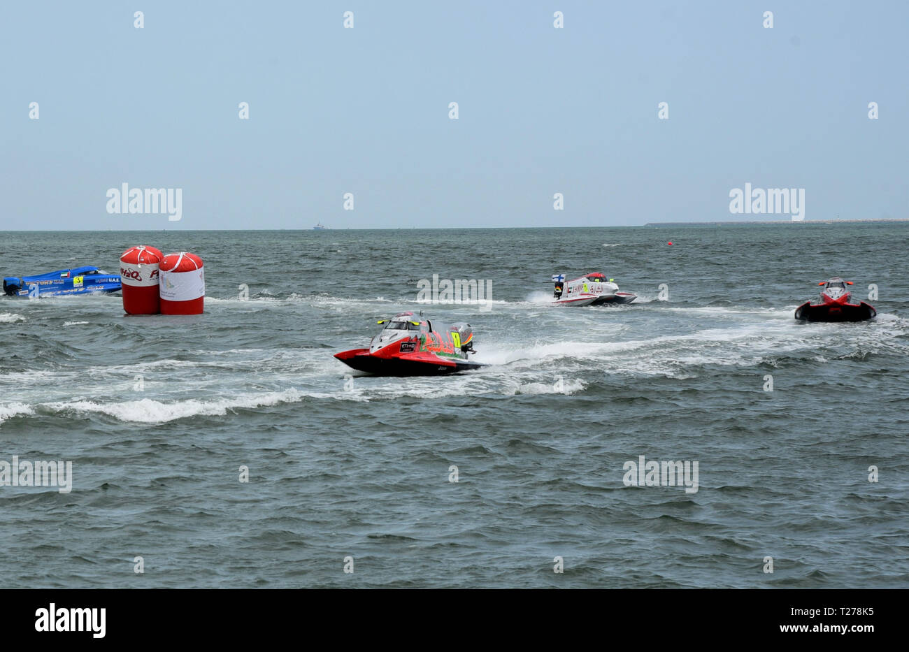 Dammam, Saudi Arabia. 30th Mar, 2019. Powerboats give a brief performance to the audience in Dammam, Saudi Arabia, March 30, 2019. Due to the strong winds and rough seas, officials announced on Saturday the cancellation of the opening round of the UIM Formula 1 World Powerboat Championship (F1H2O) in Dammam. Credit: Tu Yifan/Xinhua/Alamy Live News Stock Photo