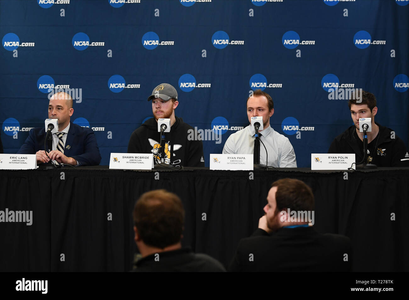 North Dakota, USA. 30th March 2019.  American International Yellow Jackets head coach Eric Lang (left) and players Shawn McBride, Ryan Papa, and Ryan Polin field questions from the media after the NCAA Men's Hockey West Regional championship game between the American International College Yellow Jackets and the Denver Pioneers at Scheels Arena, Fargo, ND. Denver defeated AIC 3-0 to move on to the Frozen Four. Photo by Russell Hons/CSM Credit: Cal Sport Media/Alamy Live News Stock Photo