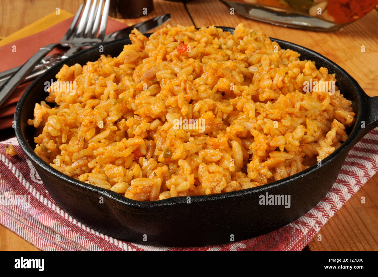 Spanish rice in a cast iron skillet Stock Photo Alamy