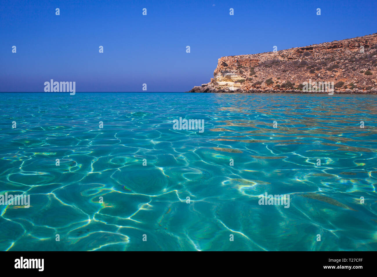 View of the most famous sea place of Lampedusa, It is named Spiaggia dei conigli,  in English language Rabbits Beach or Conigli island Stock Photo