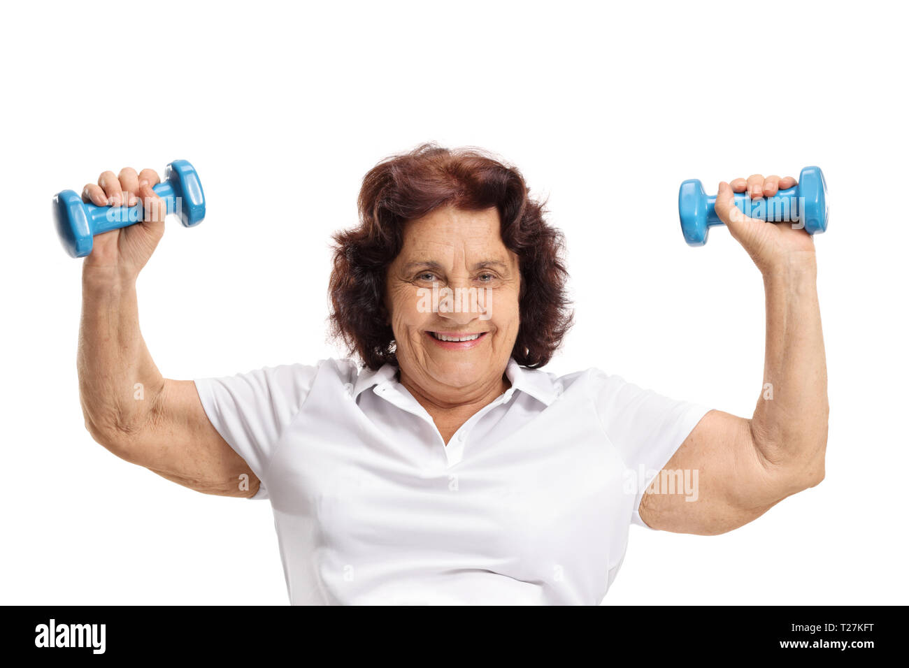 Elderly woman exercising with dumbbells isolated on white background Stock Photo