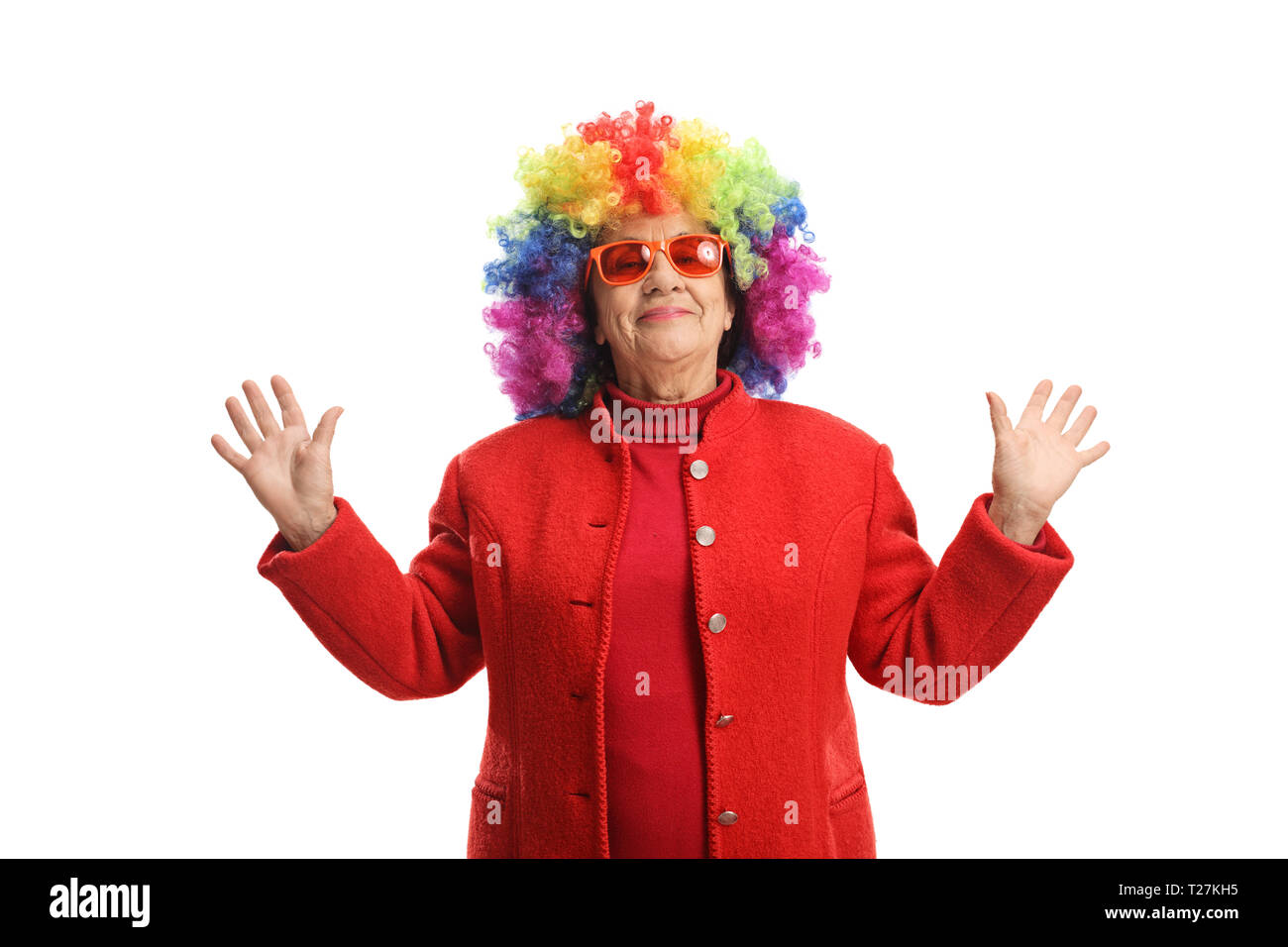 Mature woman with a colorful wig isolated on white background Stock Photo