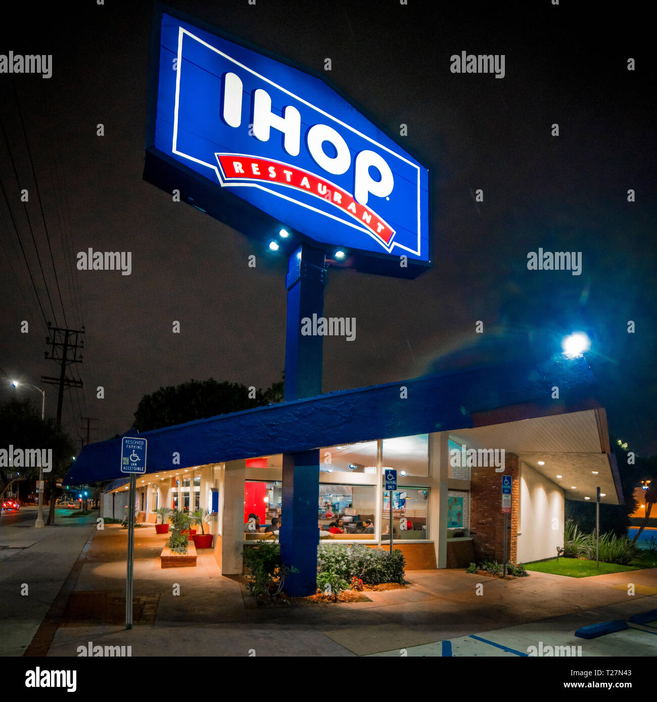 FEBRUARY 1, 2019 LOS ANGELES, CA, USA - Edward Hopper style view of Los Angeles California IHOP at night with neon sign on Stock Photo