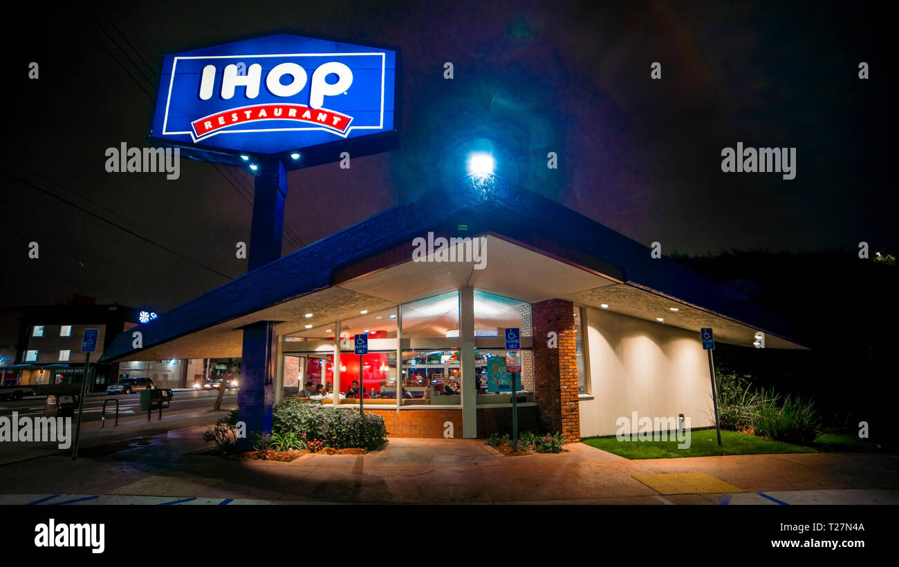 FEBRUARY 1, 2019 LOS ANGELES, CA, USA - Edward Hopper style view of Los Angeles California IHOP at night with neon sign on Stock Photo