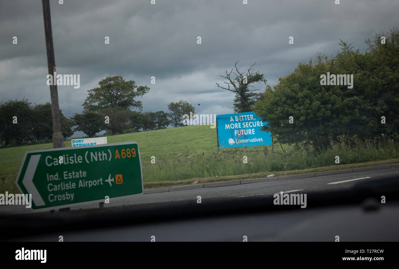 Vandalised Conservative Election Posters in Cumbria. Graffiti drawn on the signs in Penrith and the Border Constituency. Stock Photo