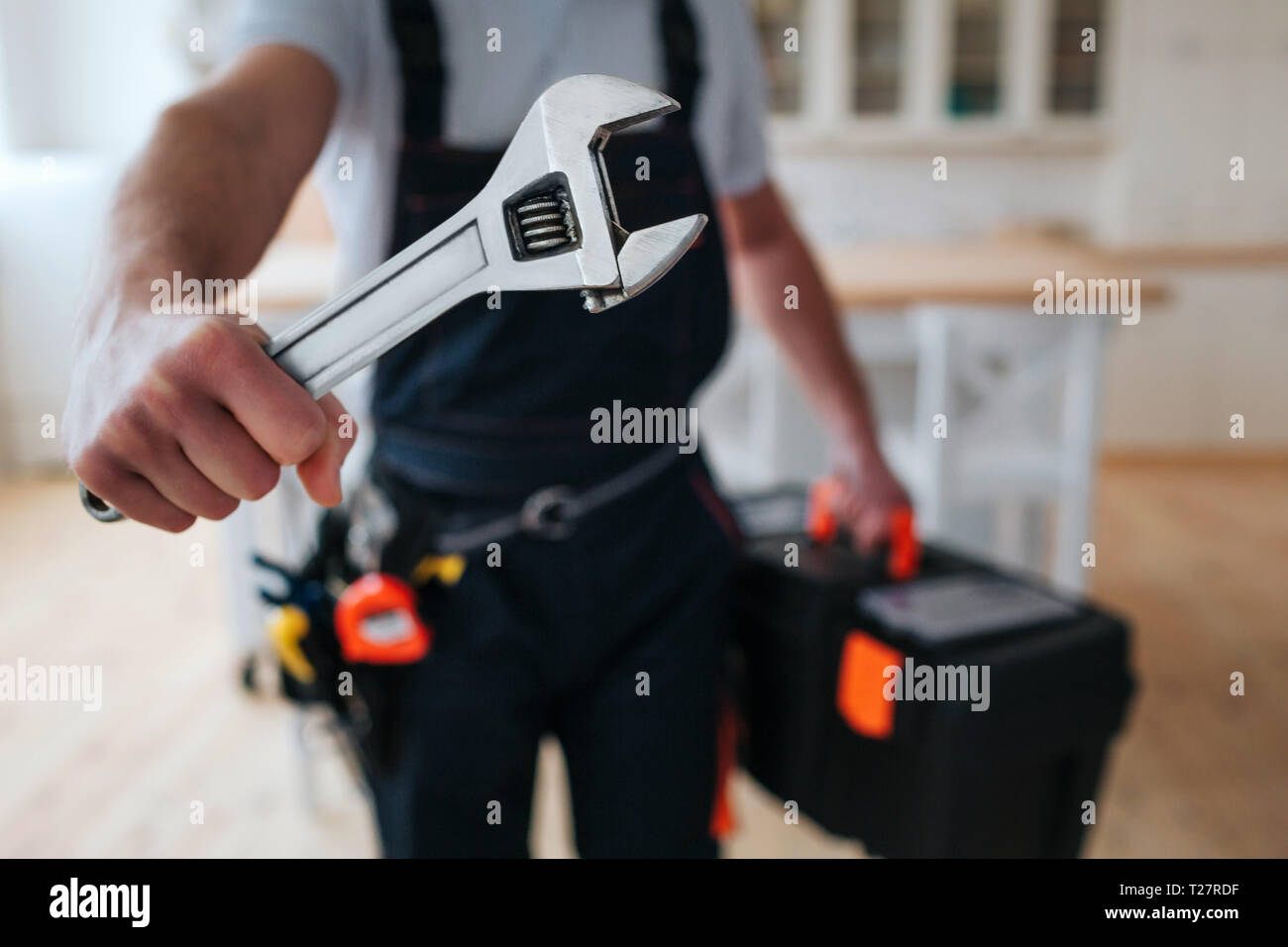 Caucasian Plumber Worker Wearing Safety Gloves Adjusting Water Sewage  Residential Stock Photo by ©welcomia 415928518