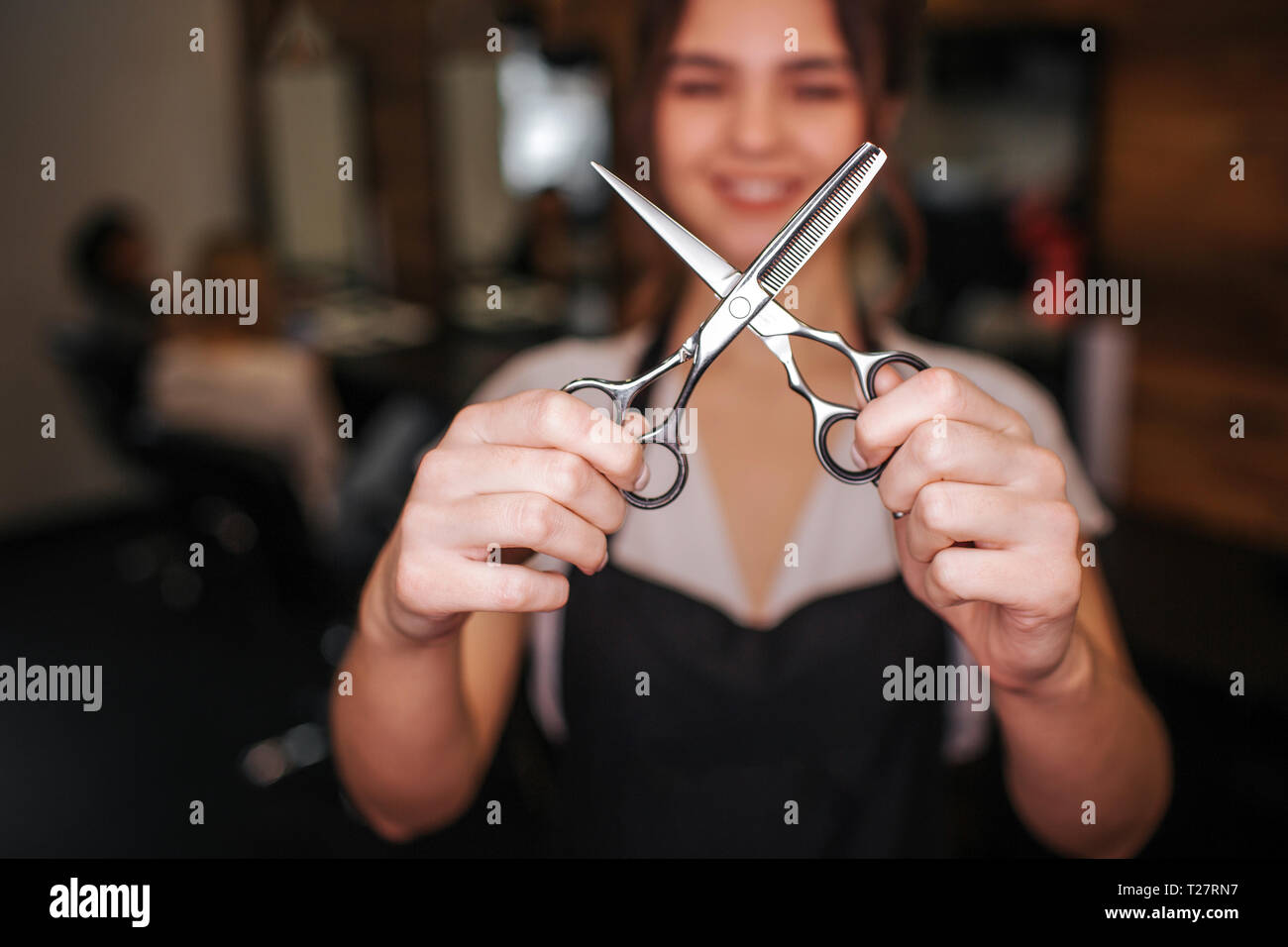 Closeup of professional metal hairdressing cutting scissors in