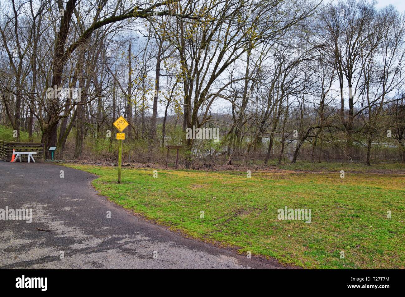 Trail and warning signs along the Shelby Bottoms Greenway and Natural