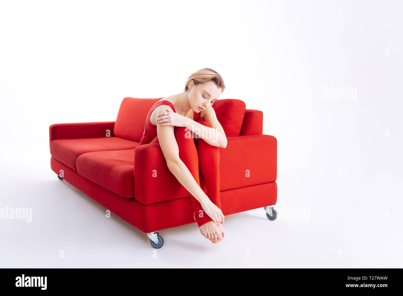 Woman feet sofa hi-res stock photography and images - Alamy