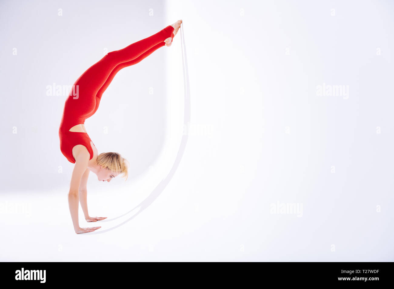 Nice blonde woman having her sports training Stock Photo