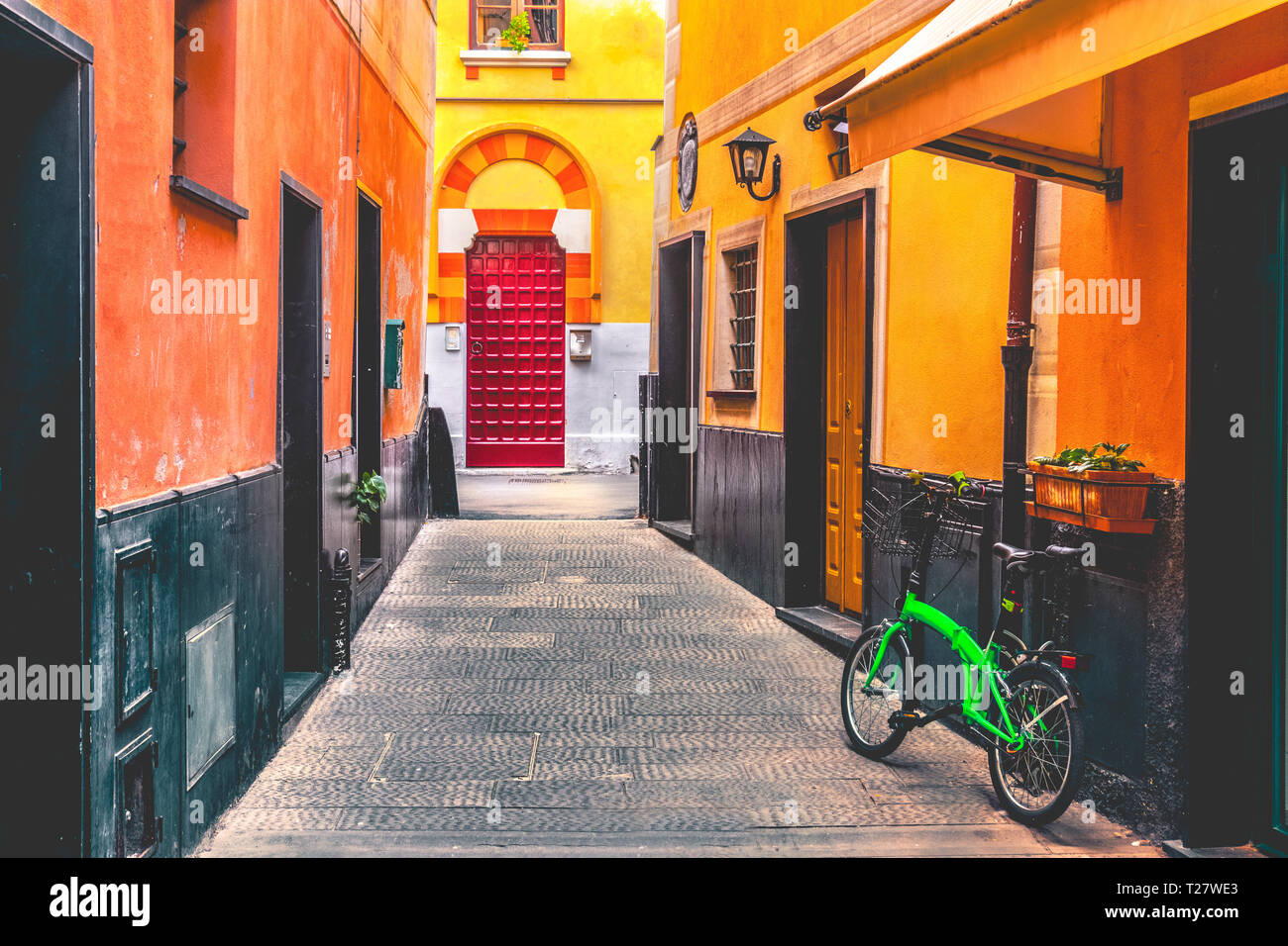 colorful italian alley bike village . Stock Photo