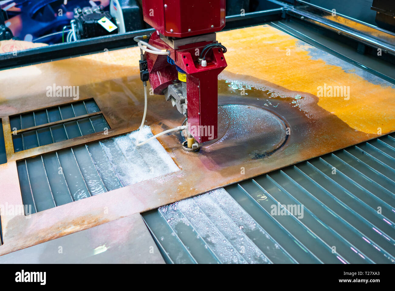 CNC water jet cutting machine modern industrial technology Stock Photo