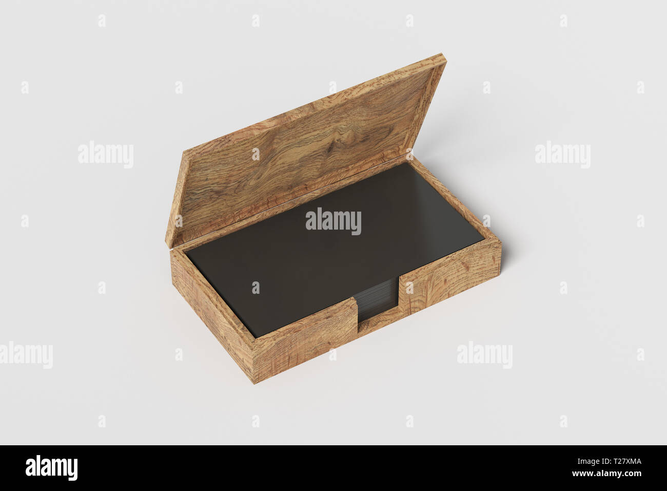 Wooden business card box holder with black business cards in stack on