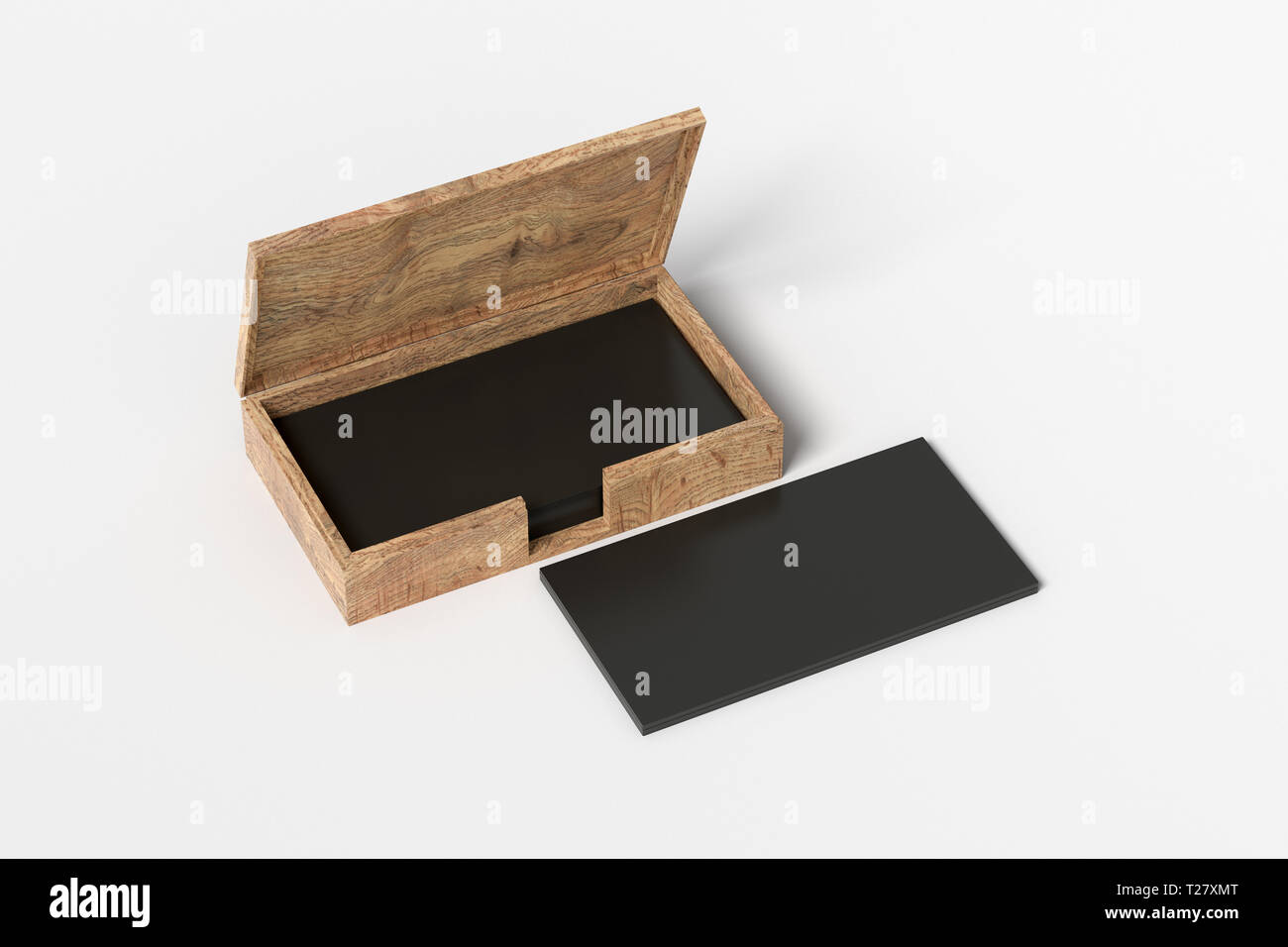 Wooden business card box holder with black business cards in stack on