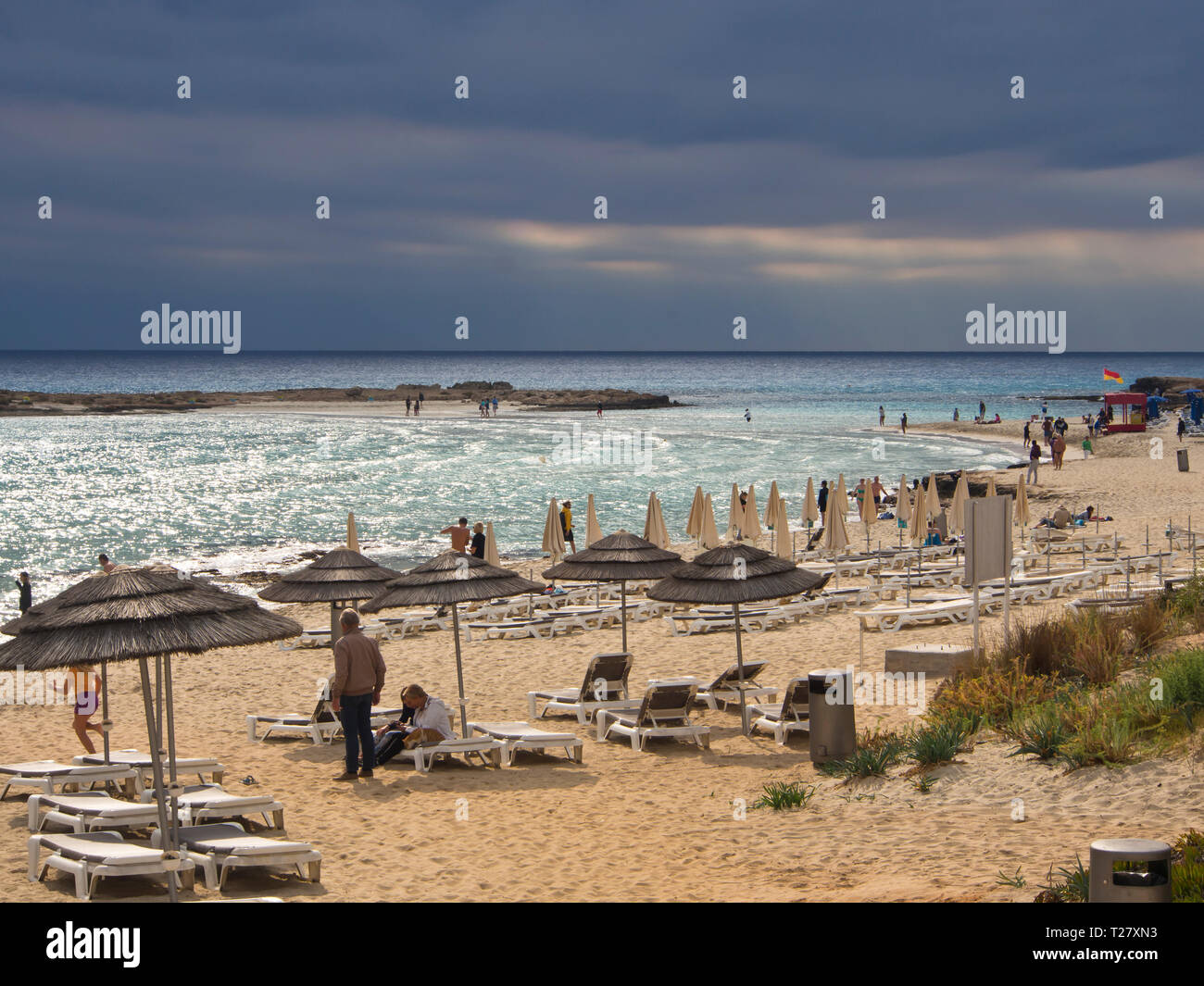 Nissi beach in Ayia Napa on the island of Cyprus, a favourite among the tourists,  autumn storm clouds gathering over the sea Stock Photo