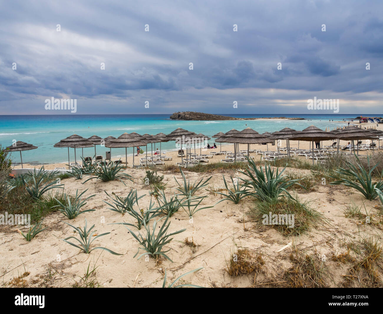 Nissi beach in Ayia Napa on the island of Cyprus, a favourite among the tourists,  autumn storm clouds gathering over the sea Stock Photo