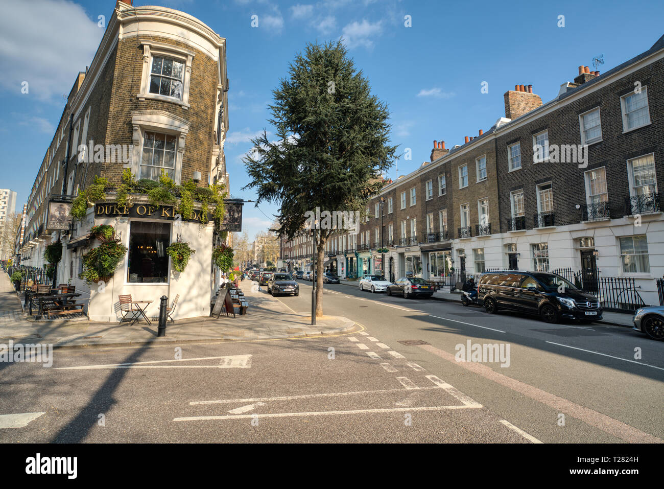 Connaught Village Hyde Park Estate's luxury retail quarter on a sunny