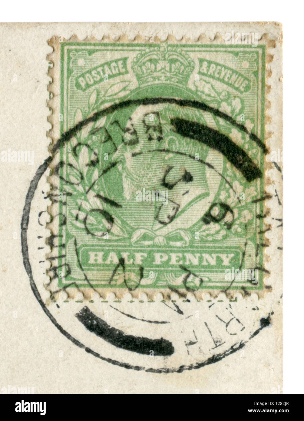 English historical stamp: green half penny stamp with a portrait of the king, Edward VII, 1910 black ink cancellation, Royal mail Stock Photo