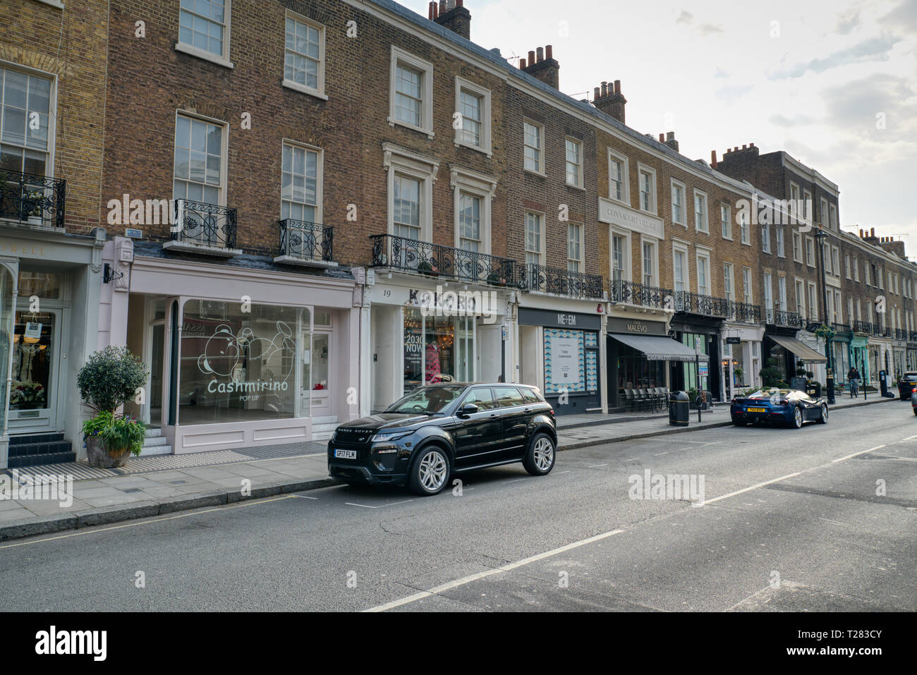 Connaught Village Hyde Park Estate's luxury retail quarter on a sunny