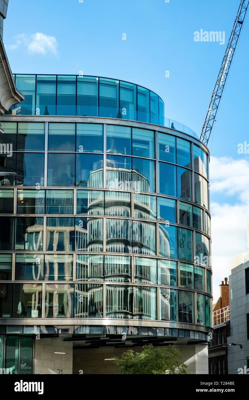 30 Cannon Street, reflecting in nearby 71 Queen Victoria Street