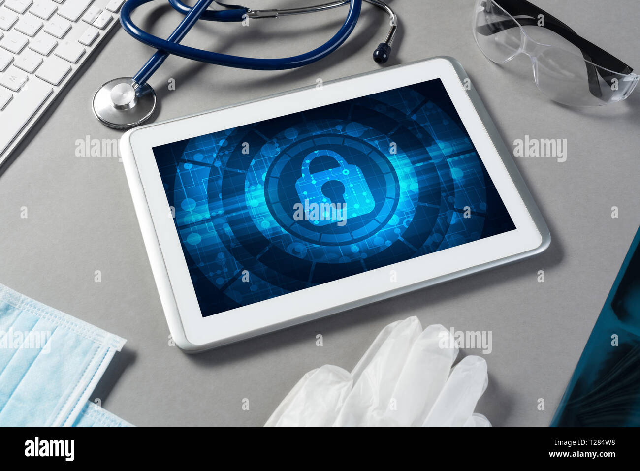 Web security and technology concept with tablet pc on table Stock Photo ...