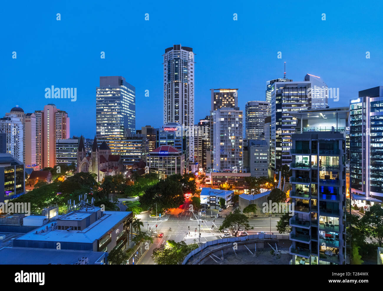The skyline of the Central Business District (CBD) at night looking towards Cathedral Square, Brisbane, Queensland, Australia Stock Photo