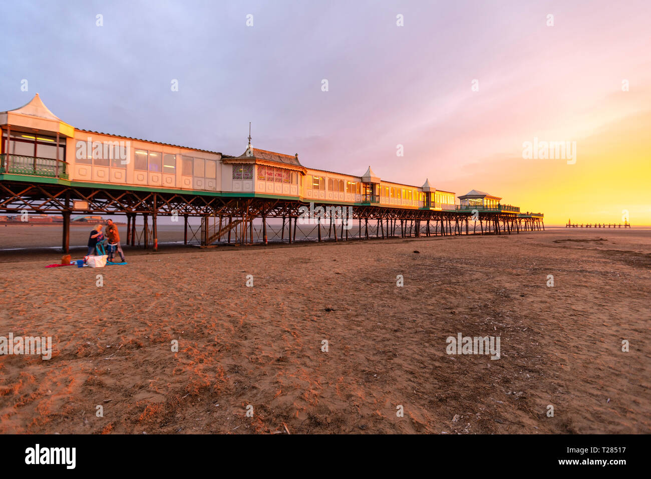 St Anne's Pier, a Victorian pier, at sunset in the English seaside resort of St Anne's-on-the-Sea, Lytham St Annes, Lancashire, UK Stock Photo