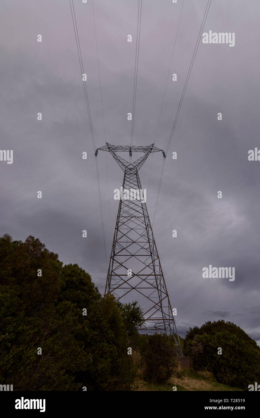 high voltage tower on background of cloudy sky Stock Photo - Alamy