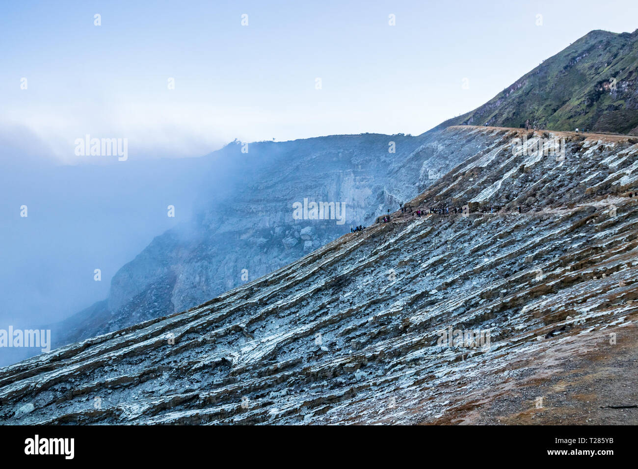 View of the Kawah Ijen volcano with toxic gases emerging from the bottom of the crater. Java, Indonesia. Stock Photo