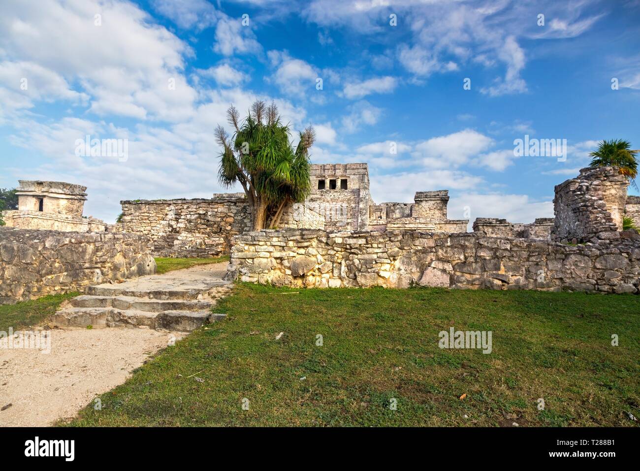 Ancient Mayan Ruins Citadel above Caribbean Sea near City of Tulum Archeological Site on Mexico Yucatan Peninsula Stock Photo