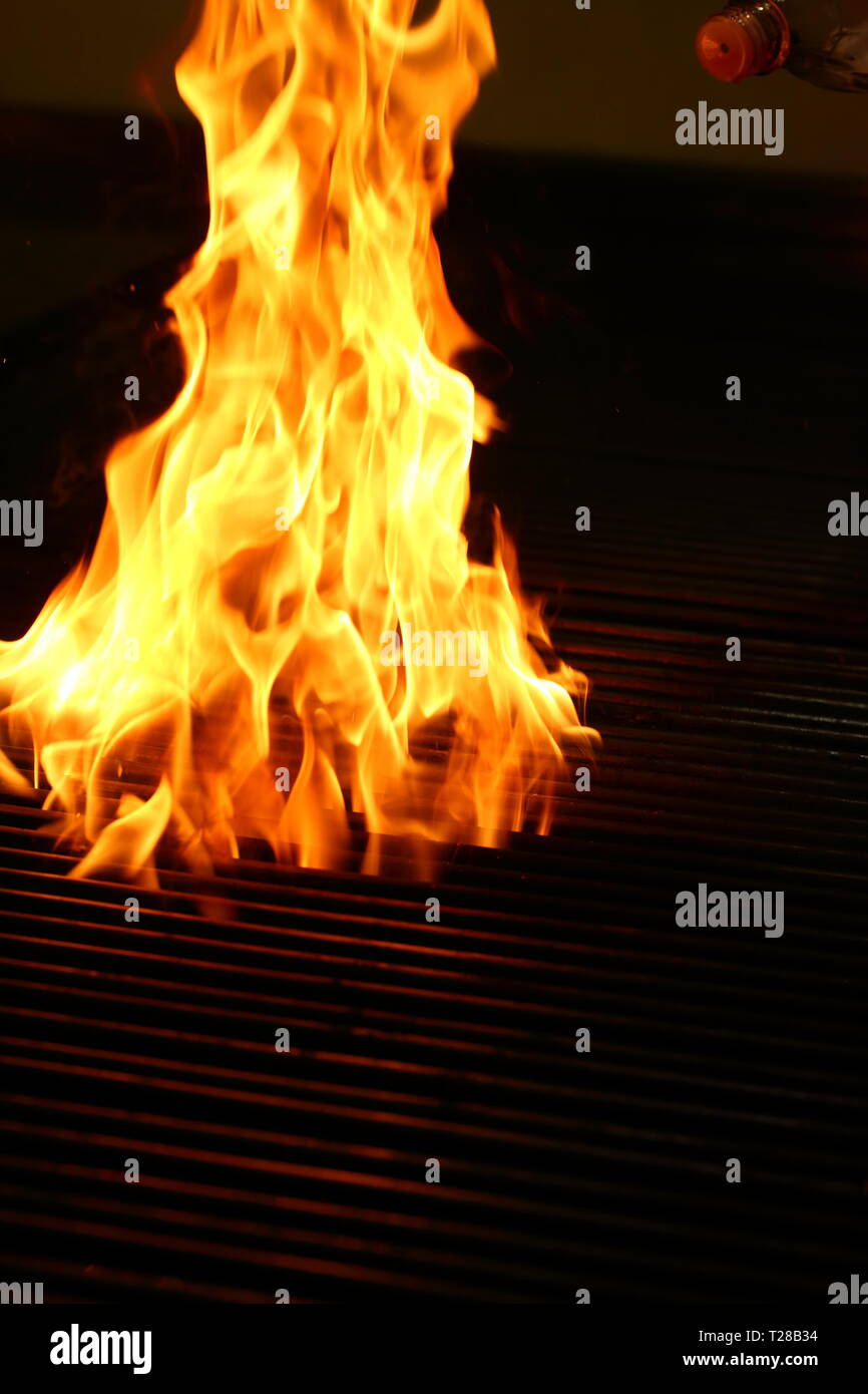 Red fire flame on black background Stock Photo - Alamy