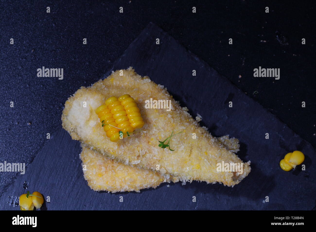 white fish breaded with coconut and bread Stock Photo Alamy