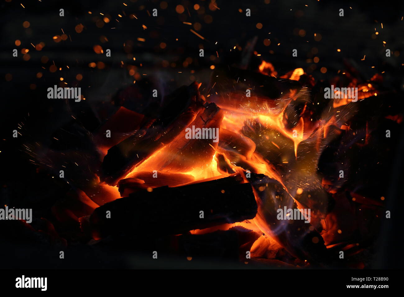 Red fire flame on black background Stock Photo - Alamy