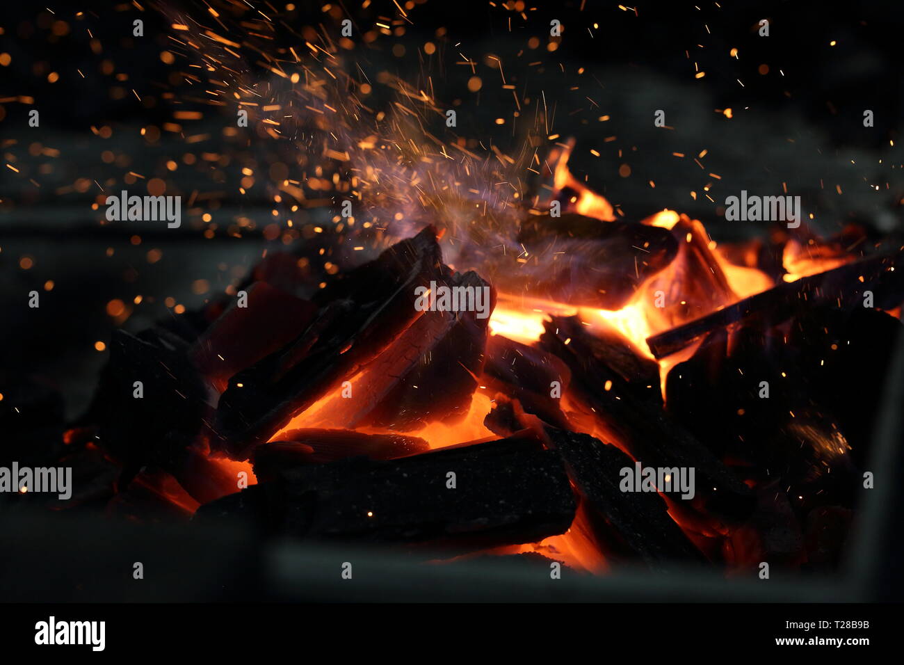 Red fire flame on black background Stock Photo - Alamy