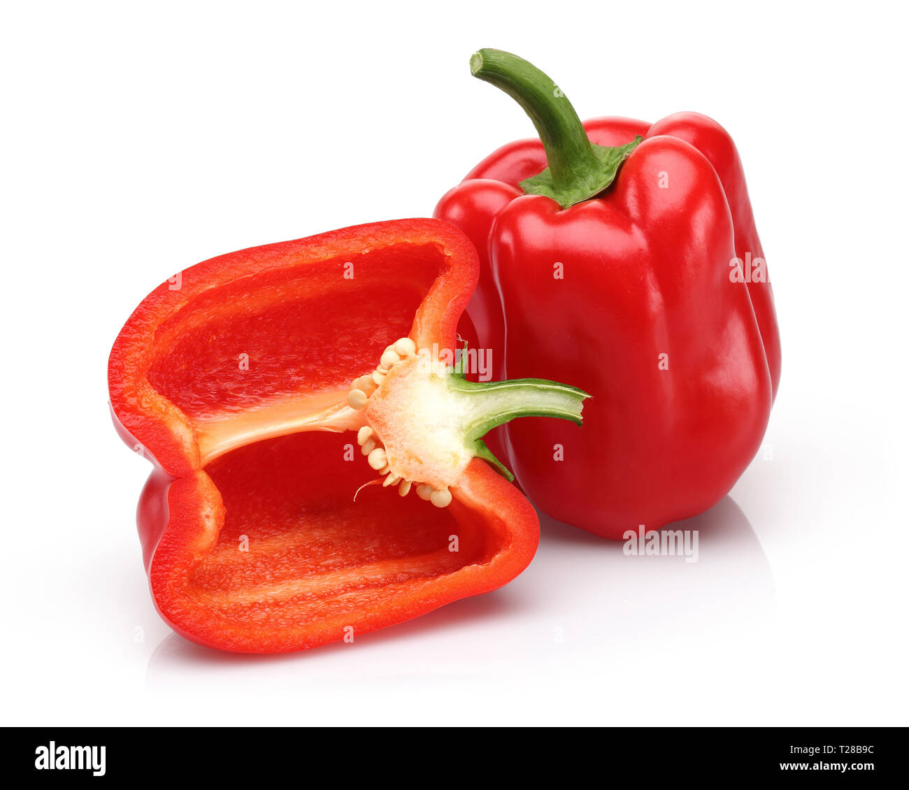 Red bell peppers isolated on white background Stock Photo - Alamy