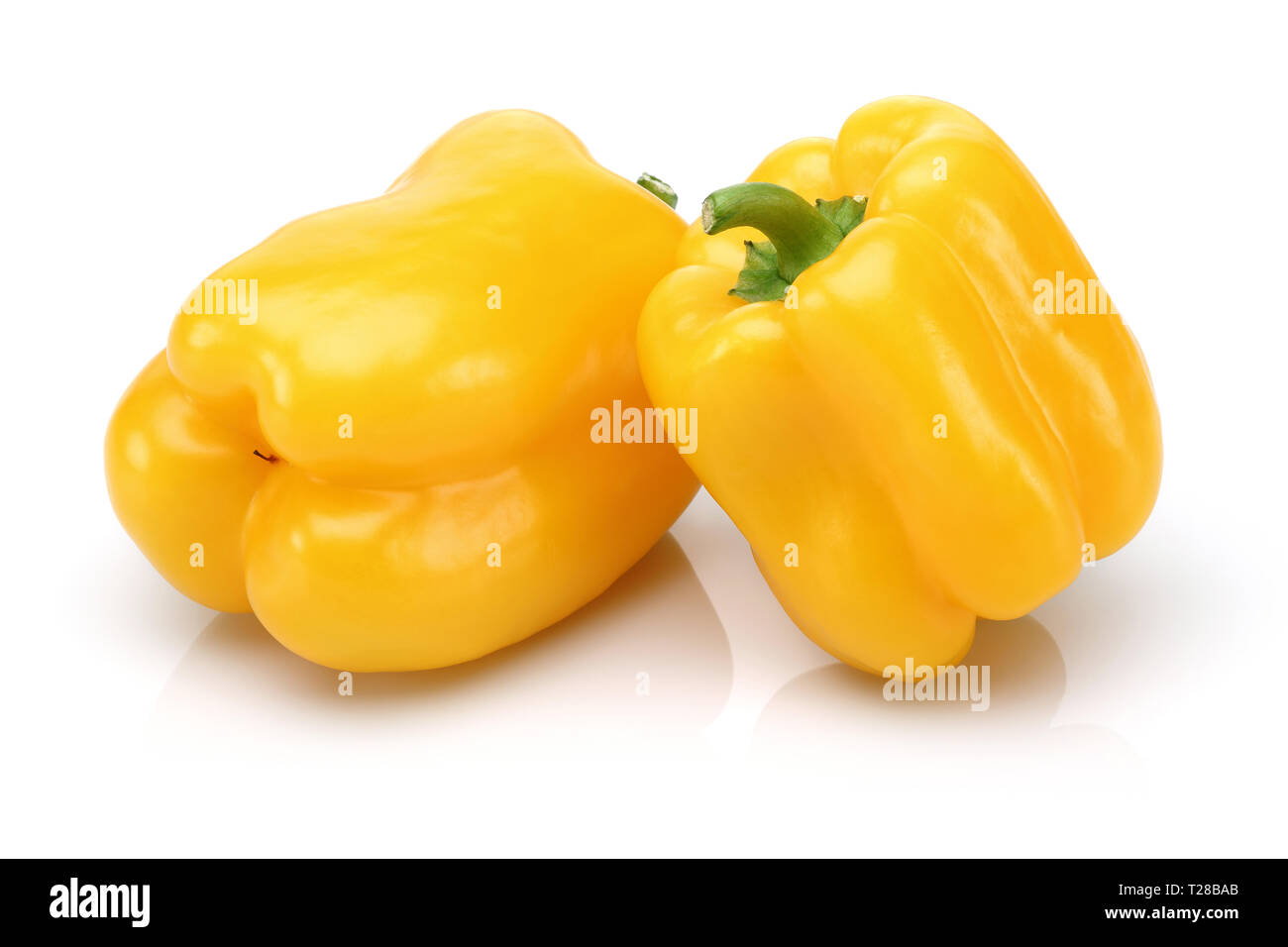 Yellow bell peppers isolated on white background Stock Photo - Alamy