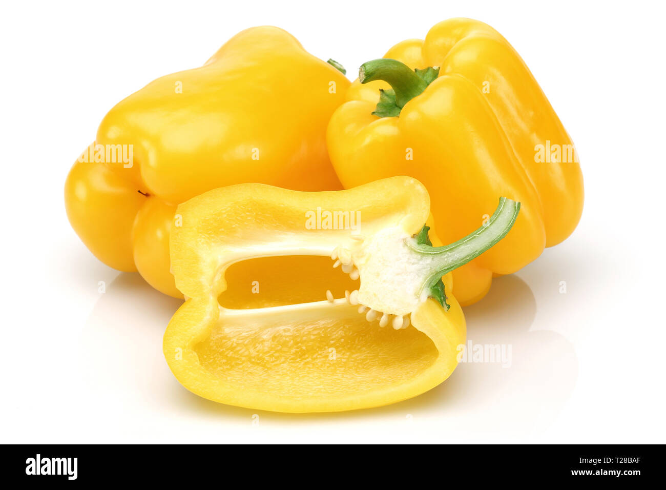 Yellow bell peppers isolated on white background Stock Photo - Alamy