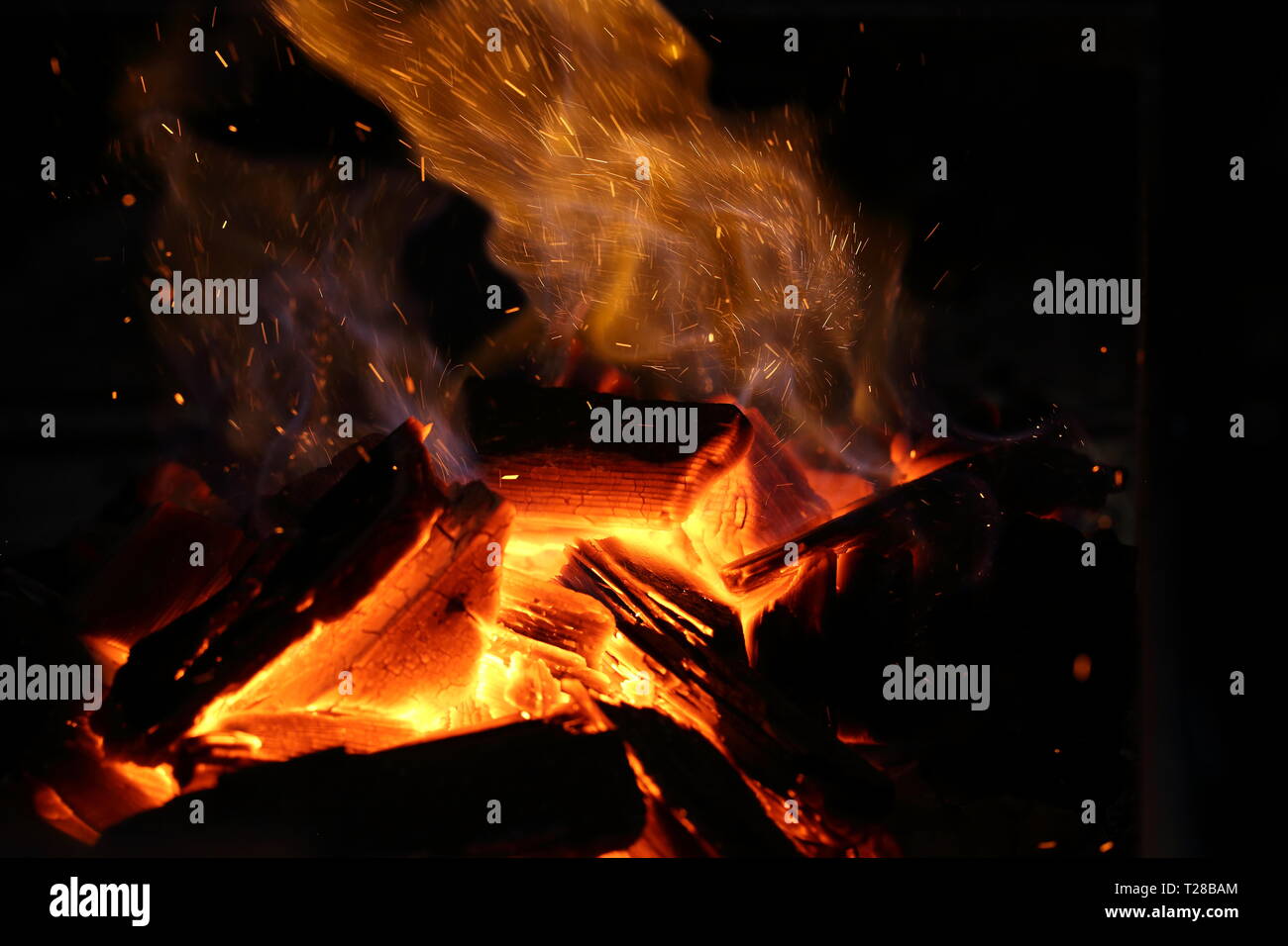 Red fire flame on black background Stock Photo - Alamy