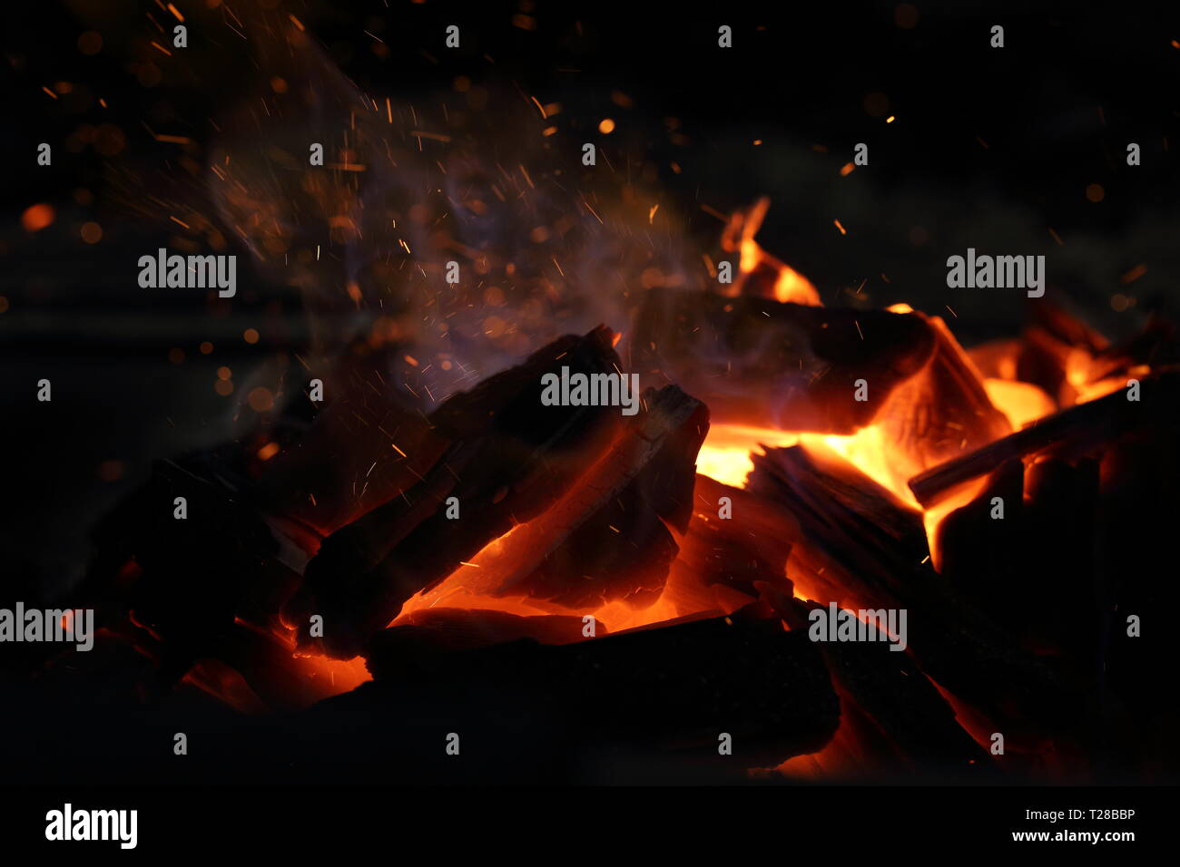Red fire flame on black background Stock Photo - Alamy