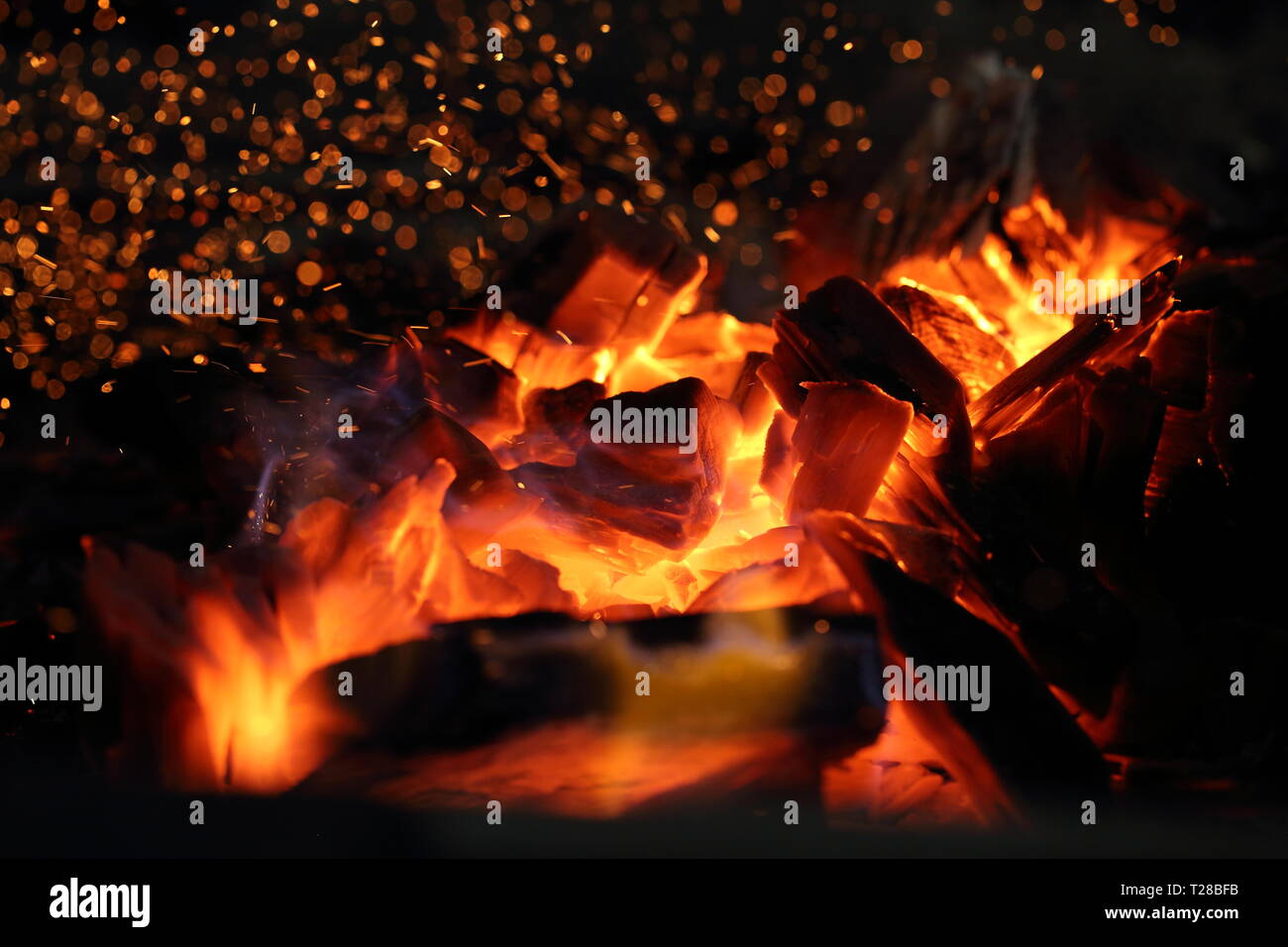 Red fire flame on black background Stock Photo - Alamy