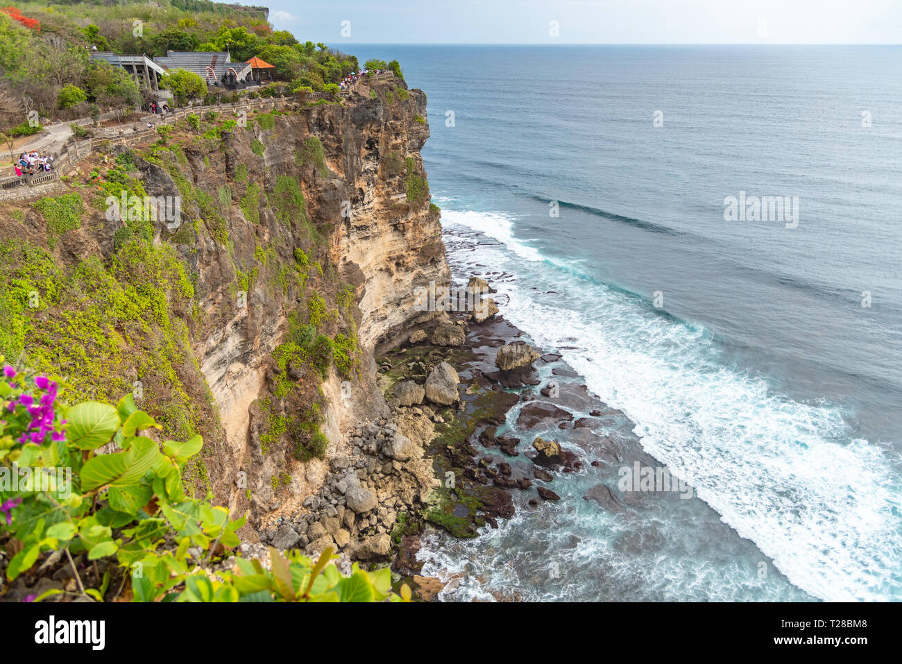 Uluwatu Temple cliff faced rugged coast Uluwatu, Bali / Indonesia - 11/07/2018 Stock Photo