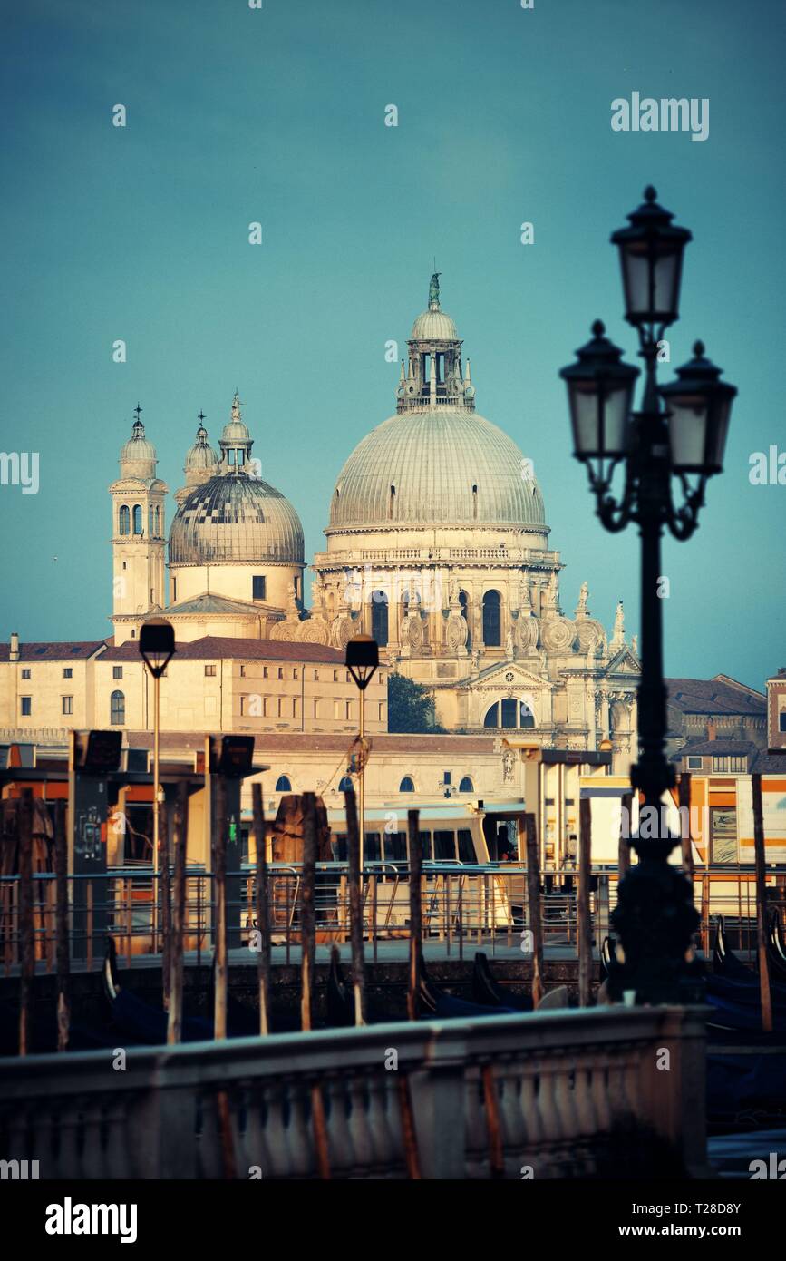 Santa Maria della Salute church street view with road lamp in Venice ...