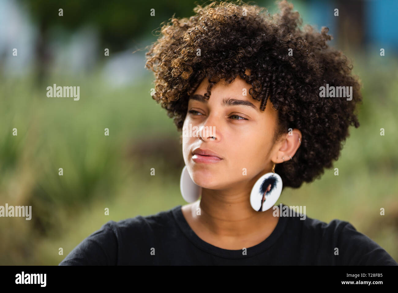 Outdoor portrait of a Young black African American woman Stock Photo ...
