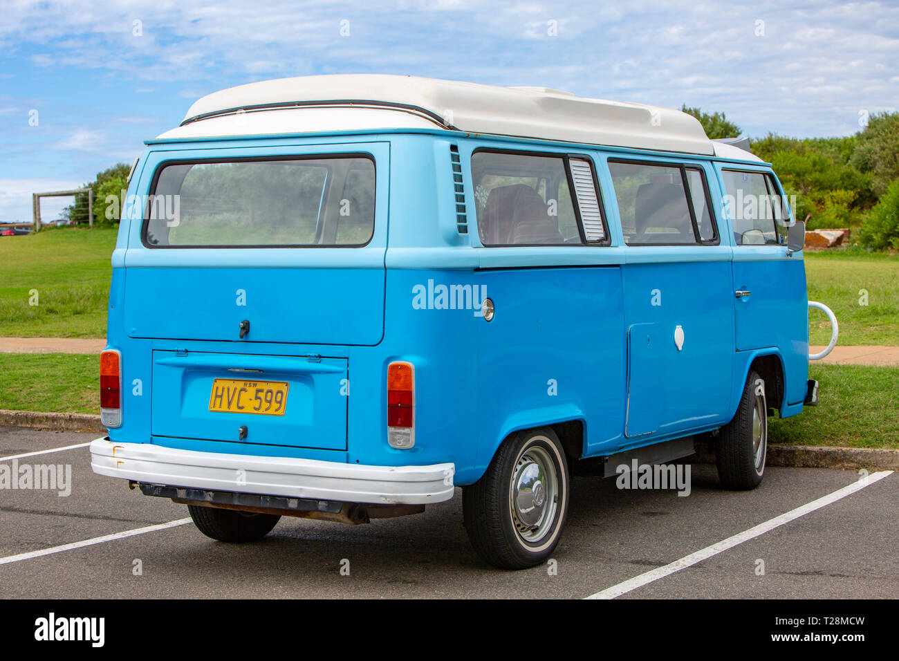Classic Volkswagen campervan kombi van parked near a Sydney beach,Australia Stock Photo