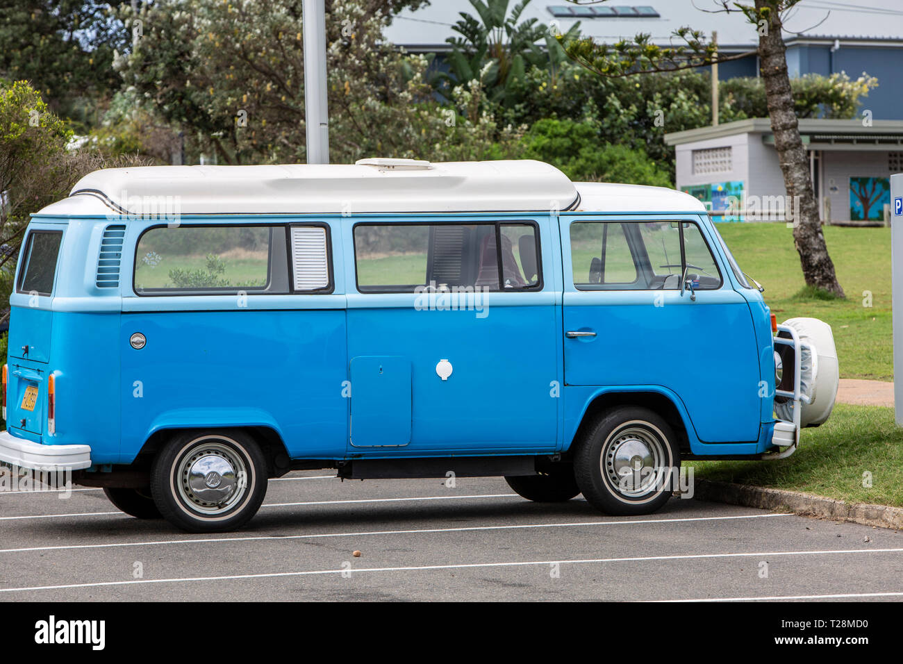 Classic campervan Volkswagen kombi van parked near a Sydney beach,Australia Stock Photo